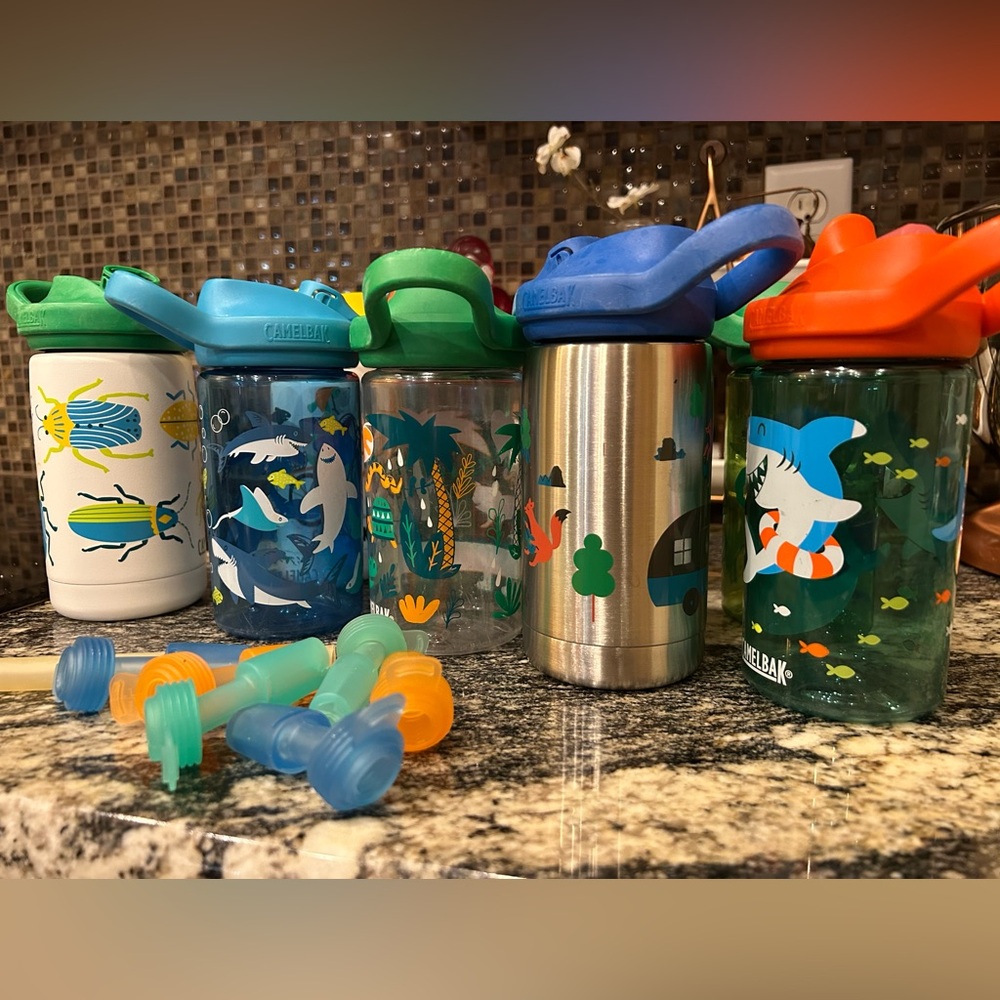 9 Camelbak Kids Water Bottles with Blue, Green, and Orange Lids